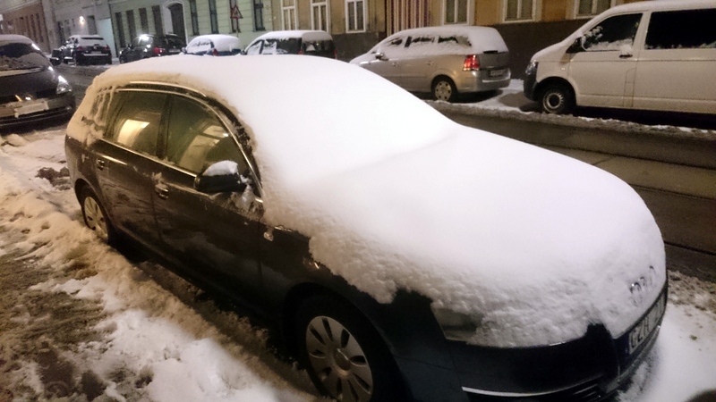 Snow covered car in Vienna.